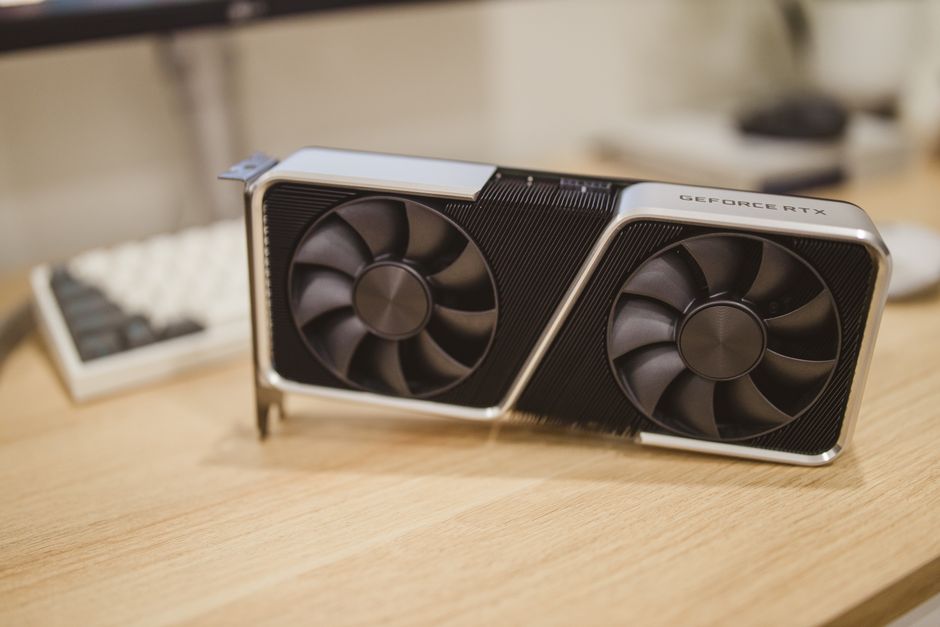Close-up of a GeForce RTX graphics card on a desk, showcasing its design and technology.