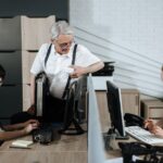 Group of diverse office workers collaborating at their desks. Professional teamwork setting.